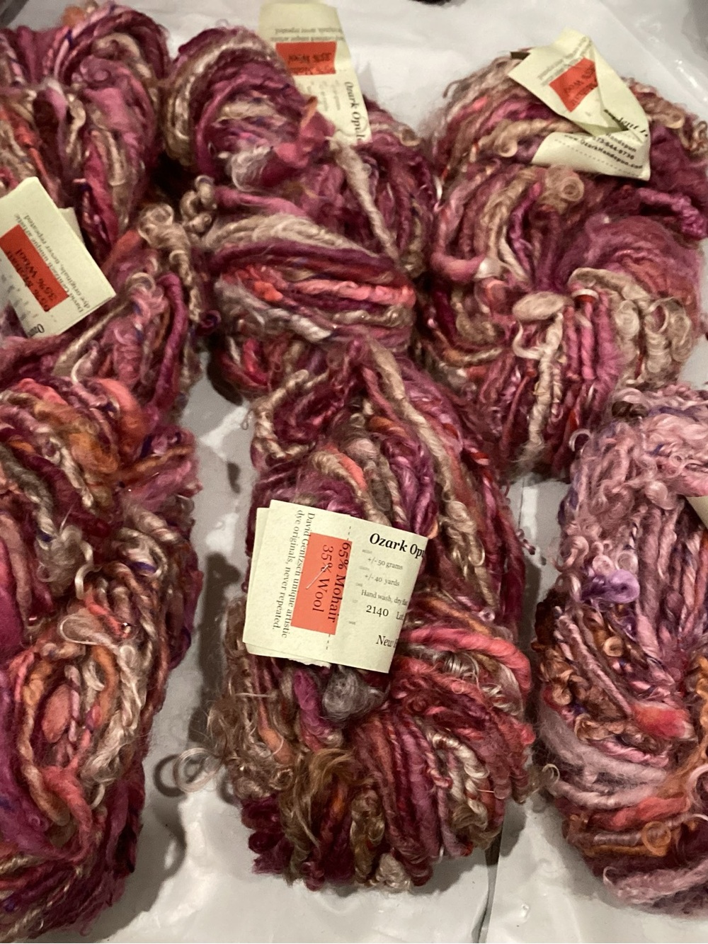 6 hanks of Ozark handspun opulence II yarn in colorway new heart (pink)